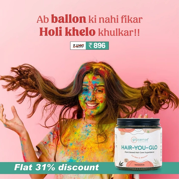 Holi creative ad: Smiling woman covered in Holi colours tossing her hair, with hair-care jar