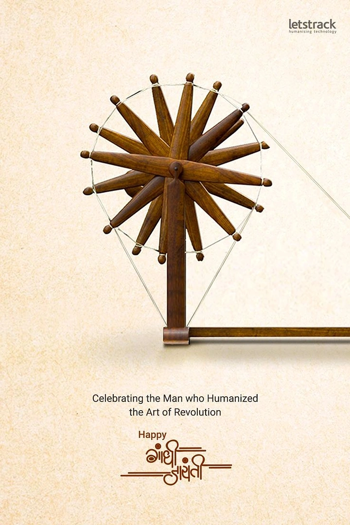 Gandhi Jayanti creative ad: Wooden charkha spinning wheel