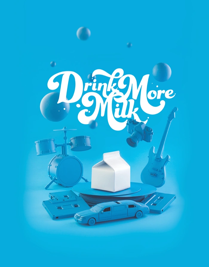 Dairy Brands creative ad: 3D carton stage with instruments, playful