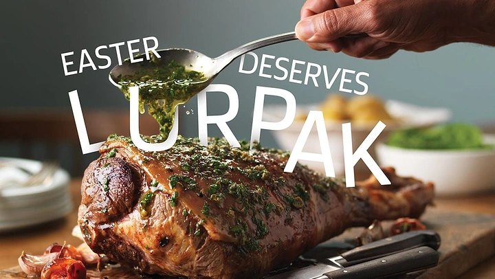 Easter creative ad: Herb-glazed roast lamb leg being drizzled