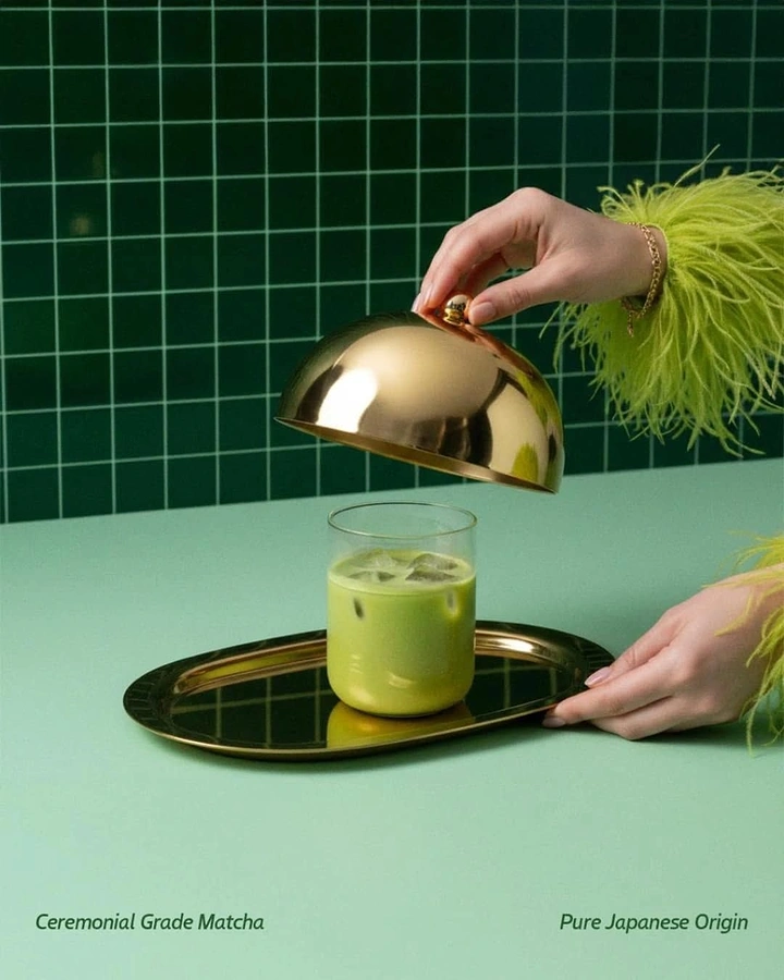 Tea & Chai Brands creative ad: Hands lifting a gold cloche to reveal iced matcha