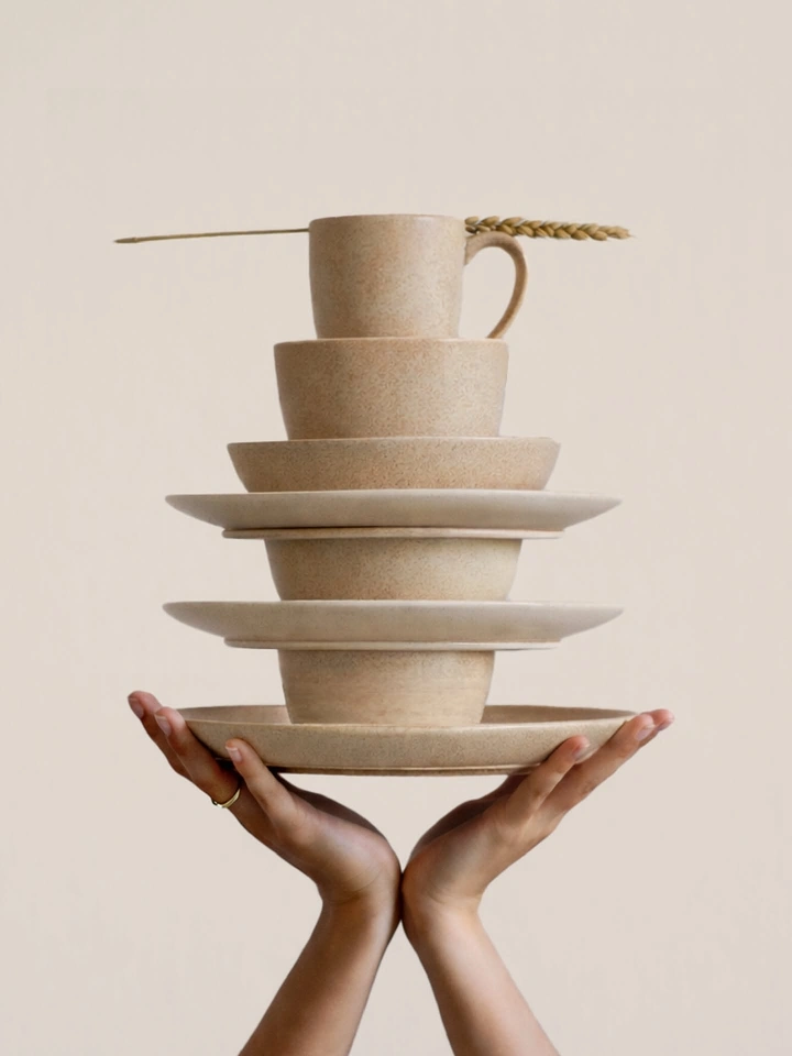 Tableware & Crockery creative ad: Balanced crockery tower becomes striking sculpture
