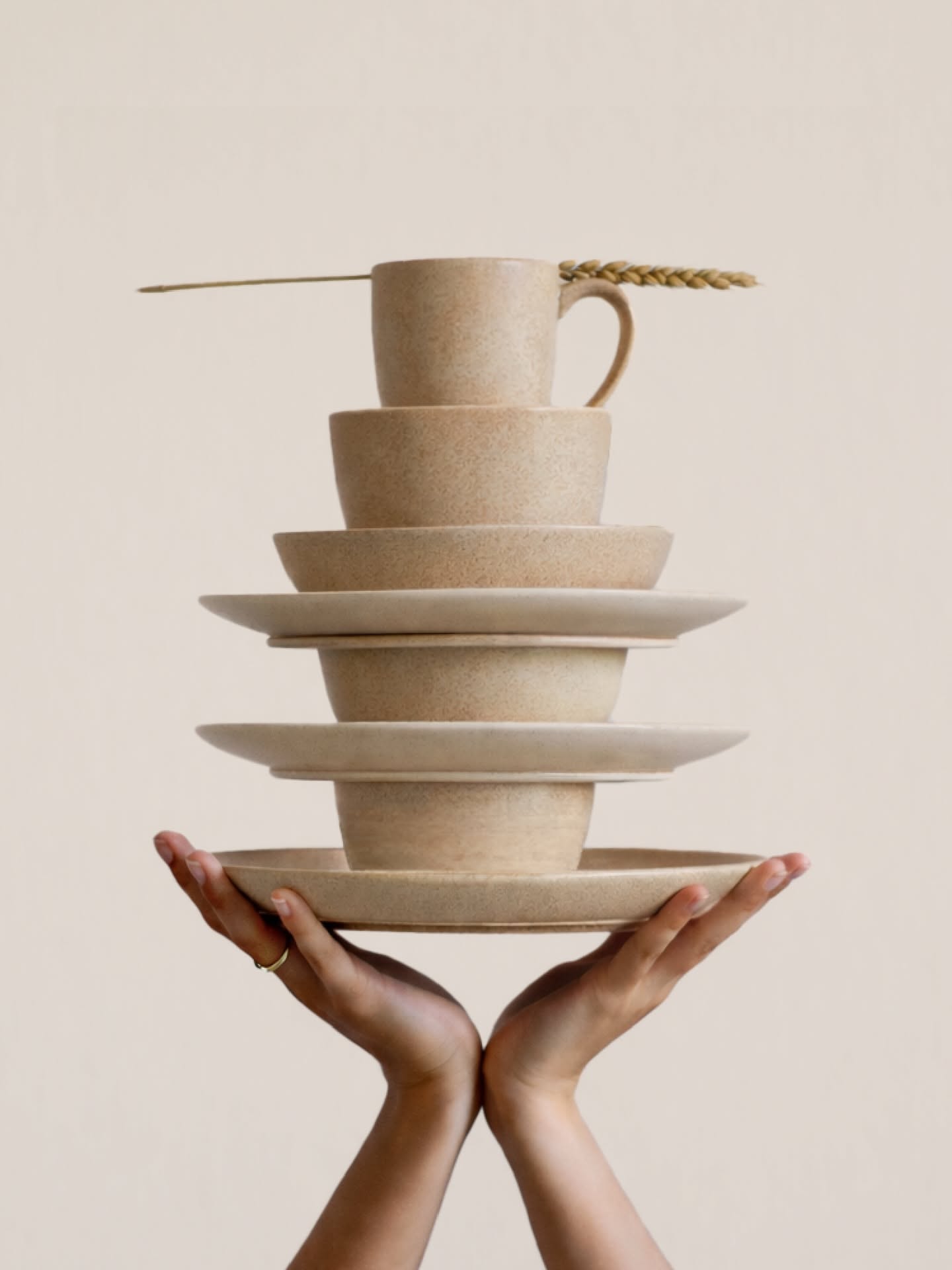 Instagram post: Balanced crockery tower becomes striking sculpture