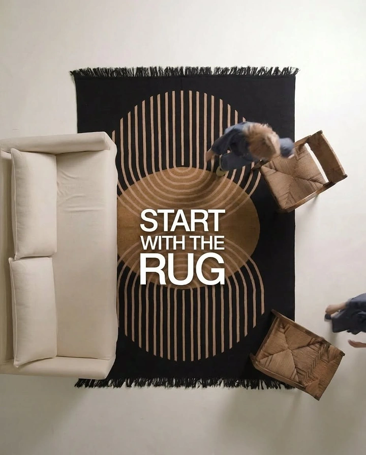 Rugs & Carpets creative ad: Rug anchors an unexpected furniture composition