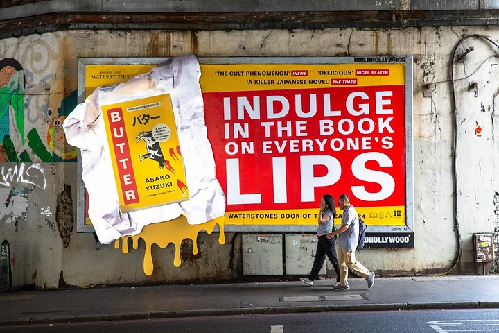 Bookstores creative ad: Book as melting butter block billboard