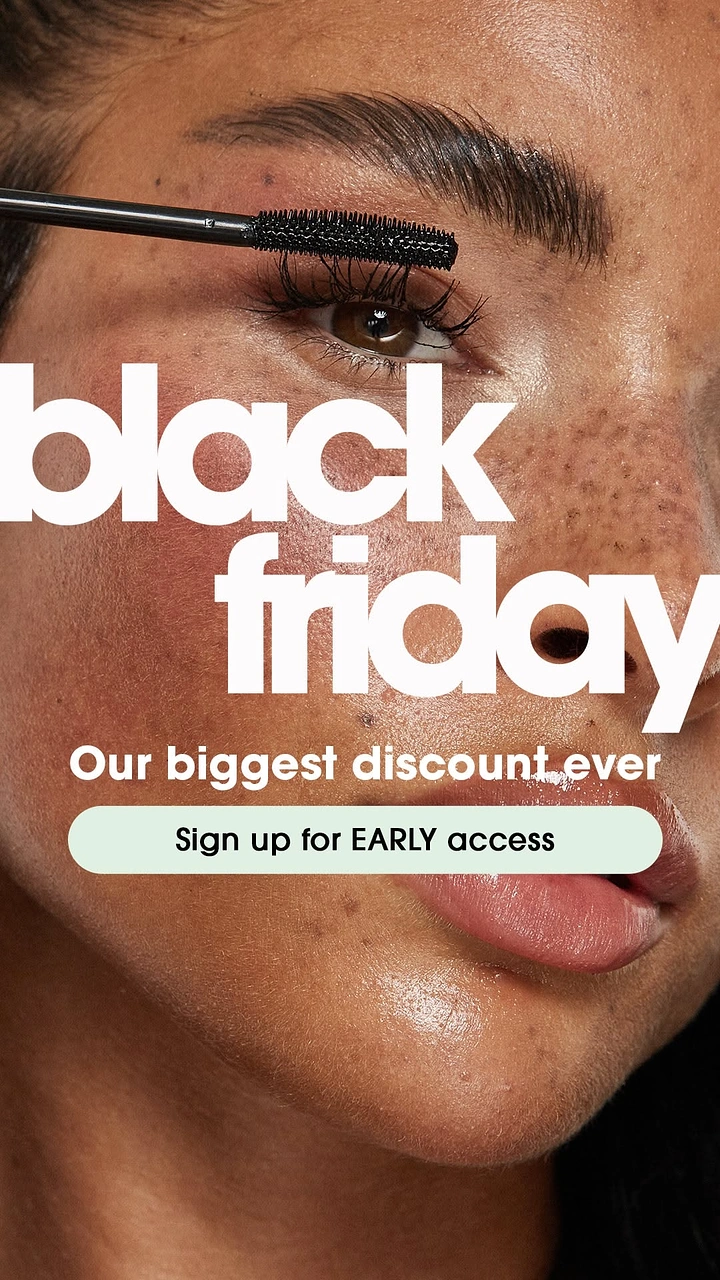 Black Friday creative ad: Extreme close-up of a freckled face with a mascara wand