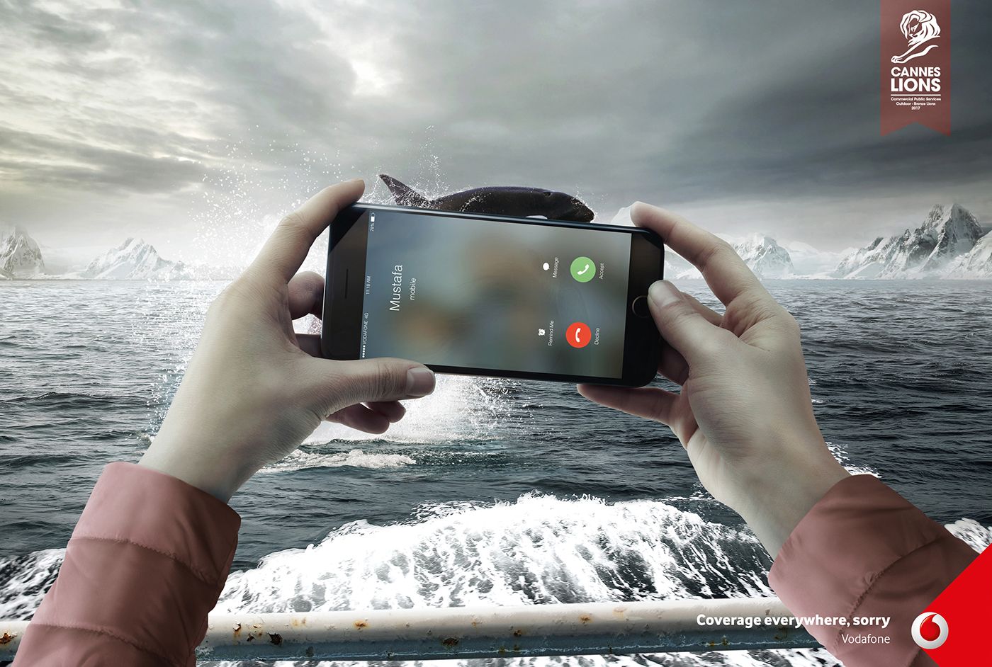 Poster: Hands holding phone with incoming call, blocking a breaching whale in arctic sea