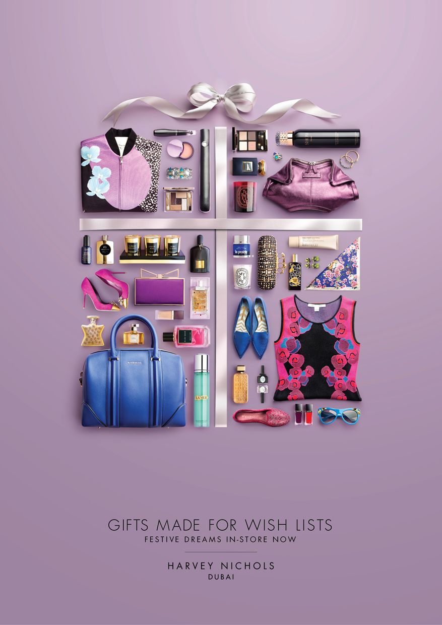Christmas Poster: Knolled luxury products arranged to form a ribboned gift box