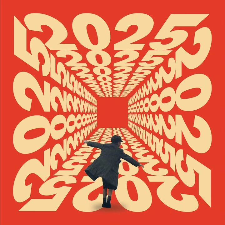 New Year creative ad: Child in overcoat walking into a tunnel made of year numerals