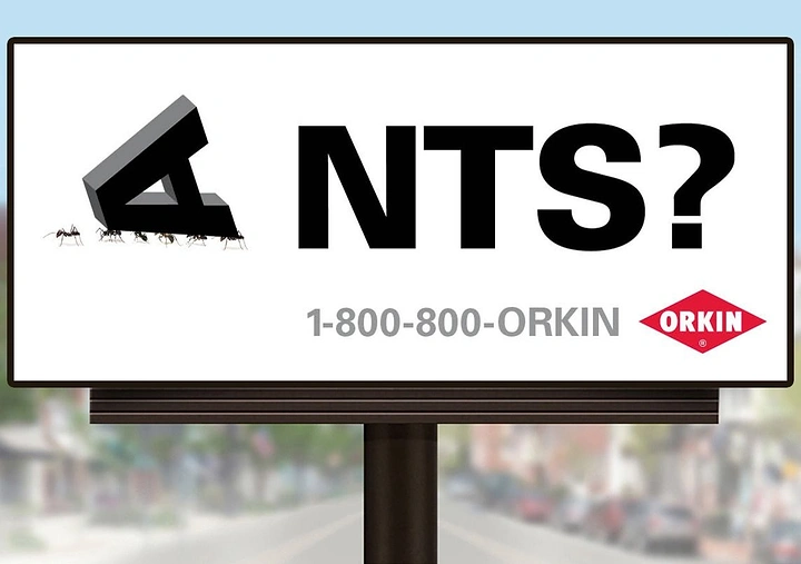 Pest Control creative ad: Ants carrying a 3D letter A away from the word