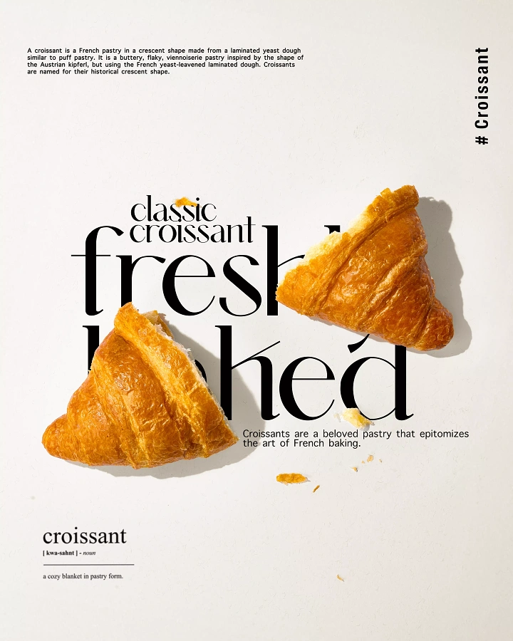 Creative ad: Croissant torn in two halves interlocking with giant serif type