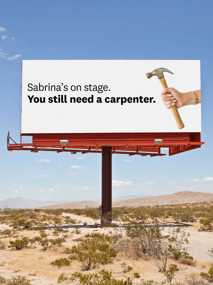 Carpenters & Woodwork creative ad: Desert billboard with a manicured hand holding a hammer