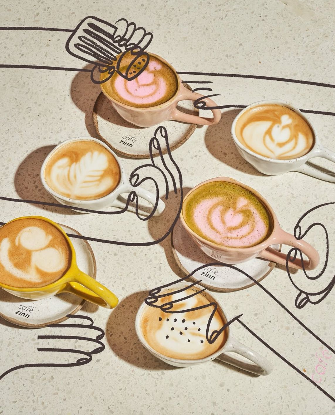 Instagram post: Overhead flat lay of latte-art cups with doodled hands reaching in