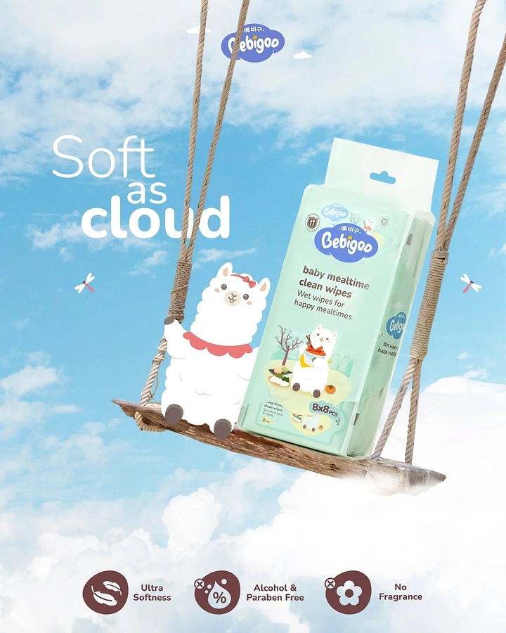 Baby Care Products creative ad: Wet-wipes pack and cartoon alpaca on a wooden rope swing in the clouds