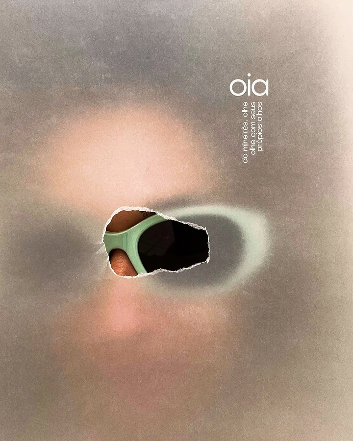 Creative ad: Sharp mint sunglasses revealed through a torn hole in a blurred portrait