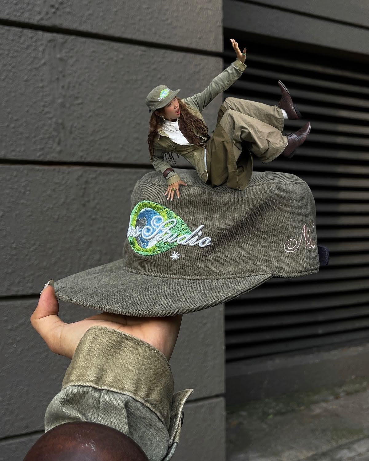 Instagram post: Surreal rider composition around the cap