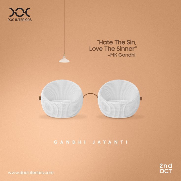 Two round white wicker chairs forming Gandhi's spectacles