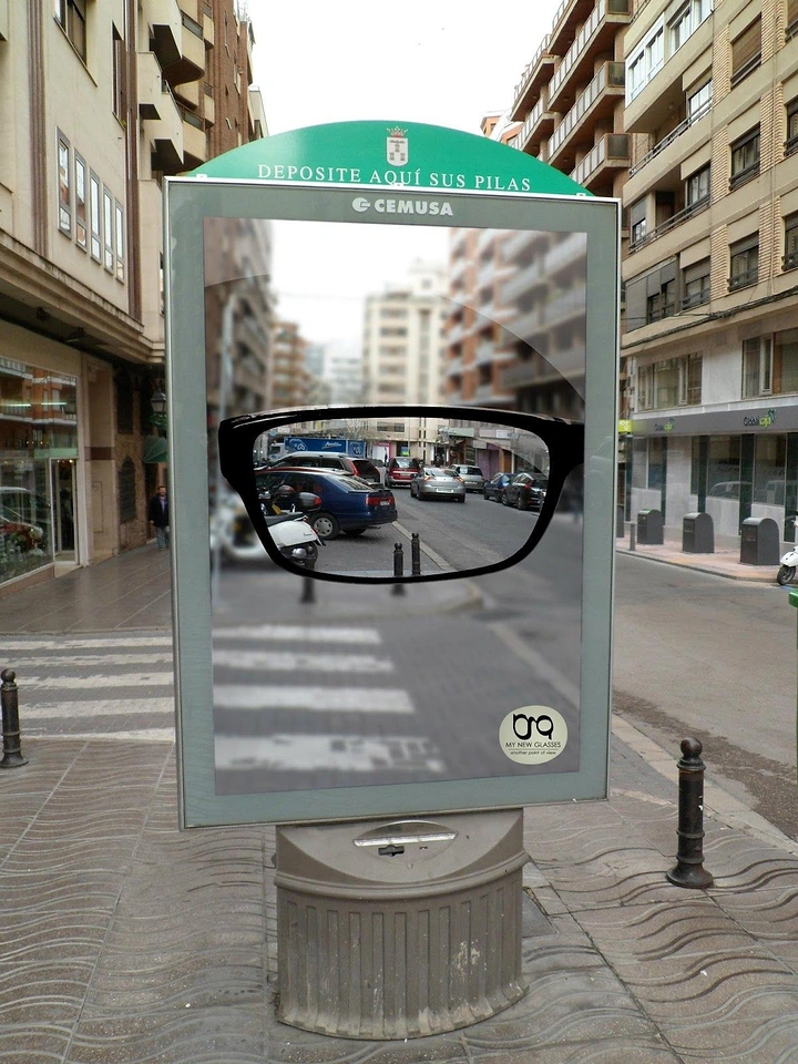 Opticians & Eye Care creative ad: Bus-stop poster glasses frame the real street