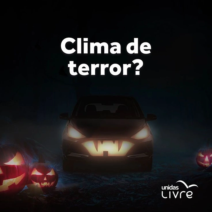 Halloween creative ad: Car front whose glowing headlights and grille form a monster face