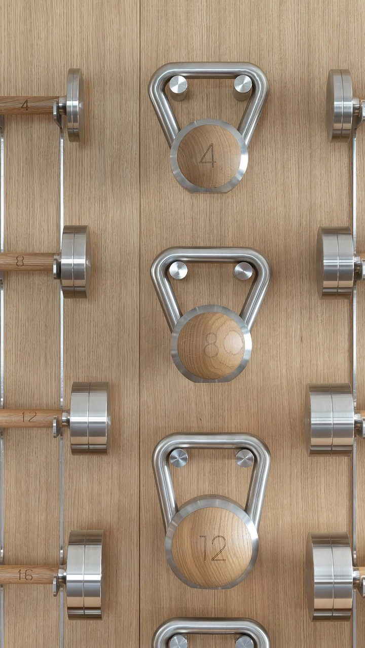 Fitness Equipment Stores creative ad: Dumbbells reimagined as wall hardware