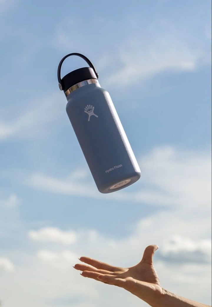Tumblers, Flasks & Drinkware creative ad: Floating bottle suggests freedom
