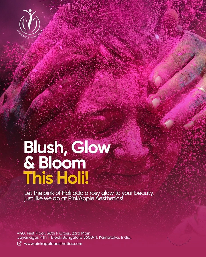 Holi creative ad: Face covered in magenta Holi powder with hands on head