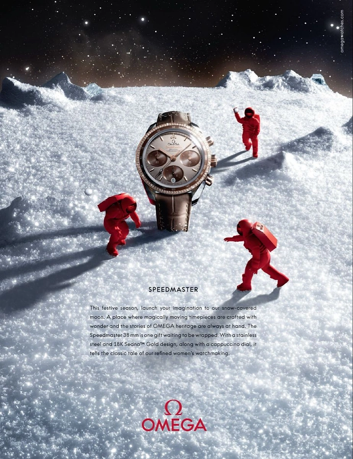 Christmas creative ad: Luxury chronograph watch standing upright on a snowy lunar surface with tiny red astronauts