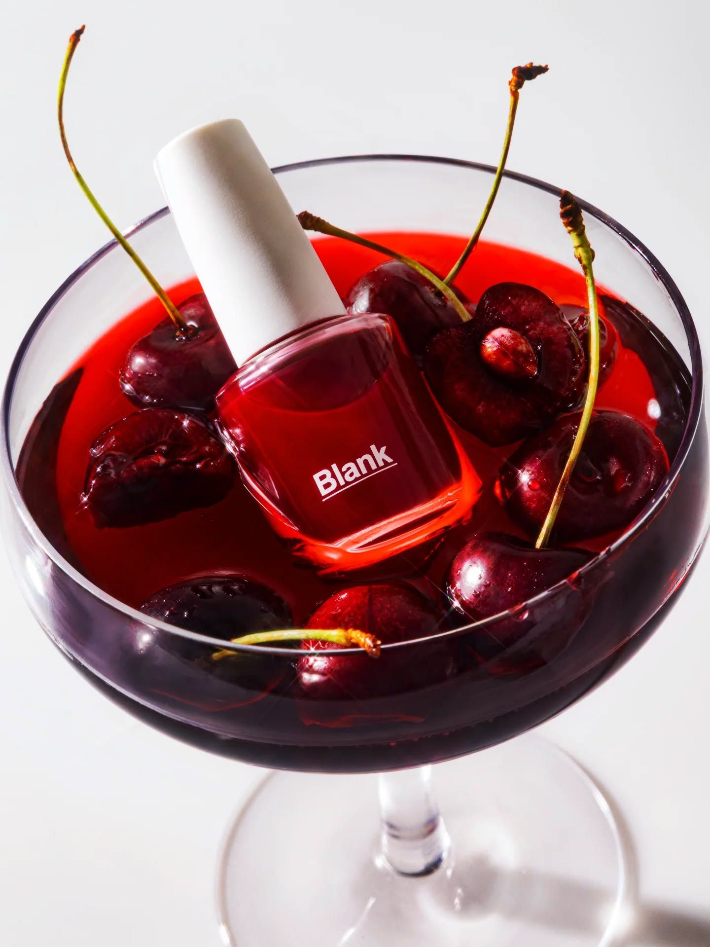 Instagram post: Polish bottle becomes cherry cocktail centerpiece