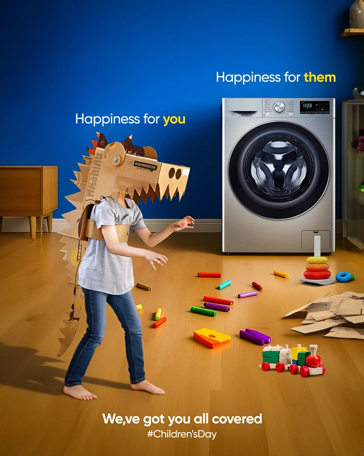 Children's Day creative ad: Child in cardboard dinosaur costume beside a front-load washing machine