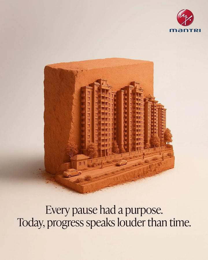 Construction creative ad: Giant clay brick carved into a miniature apartment complex