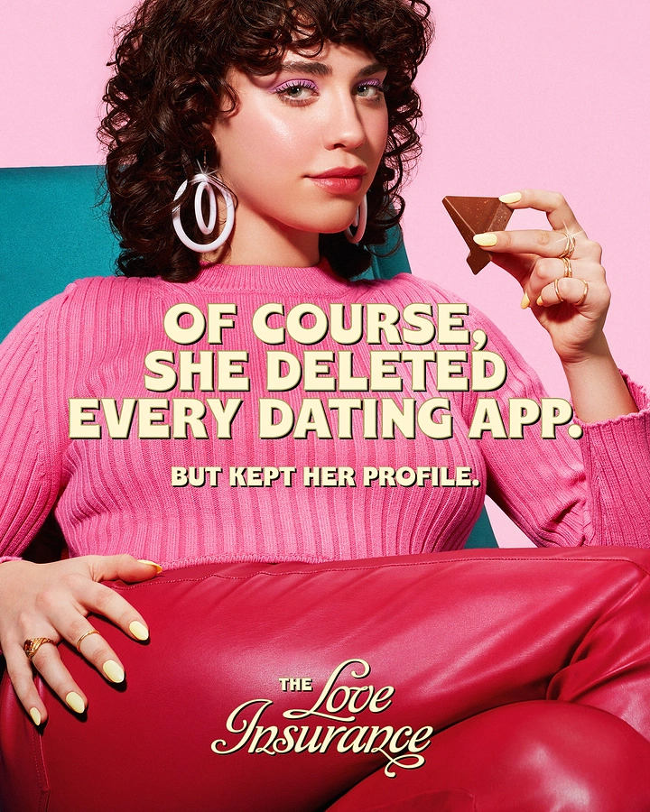 Valentine's Day creative ad: Curly-haired woman in pink sweater eating chocolate