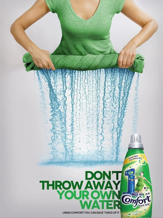Laundry & Dry Cleaning creative ad: Wrung towel pours water, save-water message