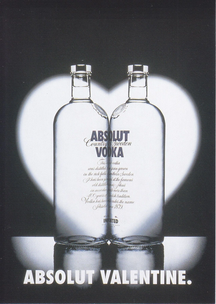Valentine's Day creative ad: Two vodka bottles pressed together, framed by a heart-shaped spotlight