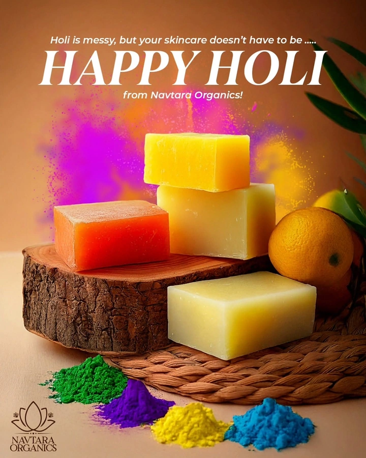 Holi creative ad: Stacked handmade soap bars on a wood slice with Holi colour powder
