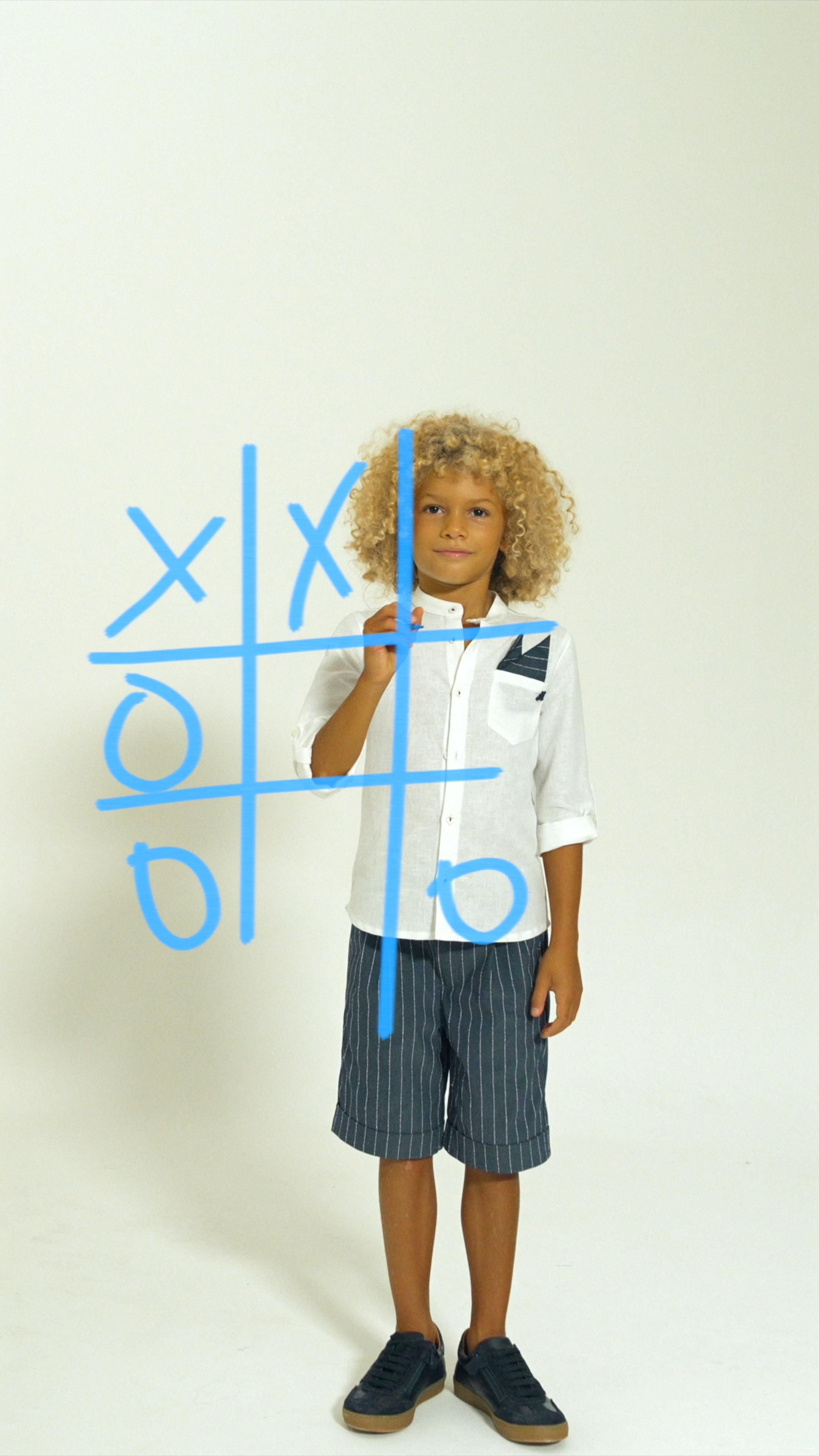 Story: Tic-tac-toe doodle framing kid