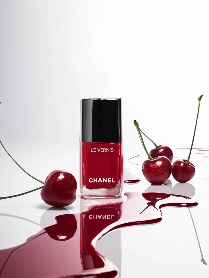 Nail Polish Brands creative ad: Cherry lacquer splash still life
