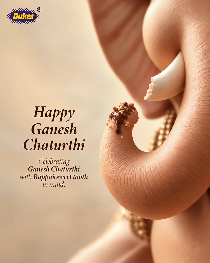 Ganesh Chaturthi creative ad: Extreme close-up of Ganesha's trunk with chocolate and crumbs