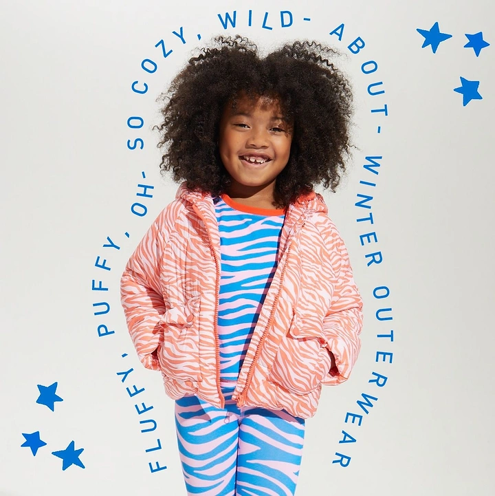 Kids Clothing creative ad: Circular copy wraps puffy-jacket child
