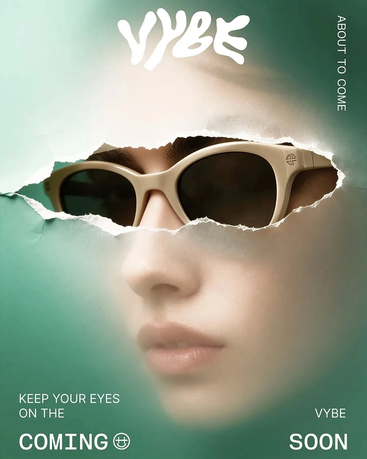 Creative ad: Model's eyes in cream sunglasses revealed through torn paper