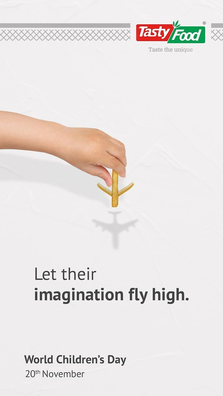Children's Day creative ad: Child's hand holding fries arranged as a plane casting an airplane shadow