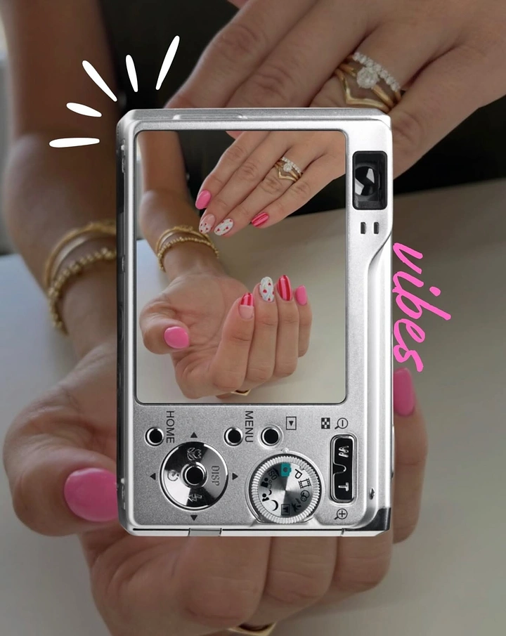 Nail Salons creative ad: Camera screen framing manicure, playful vibes