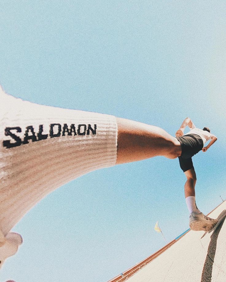 Instagram post: Surreal leg-and-sock fashion composition