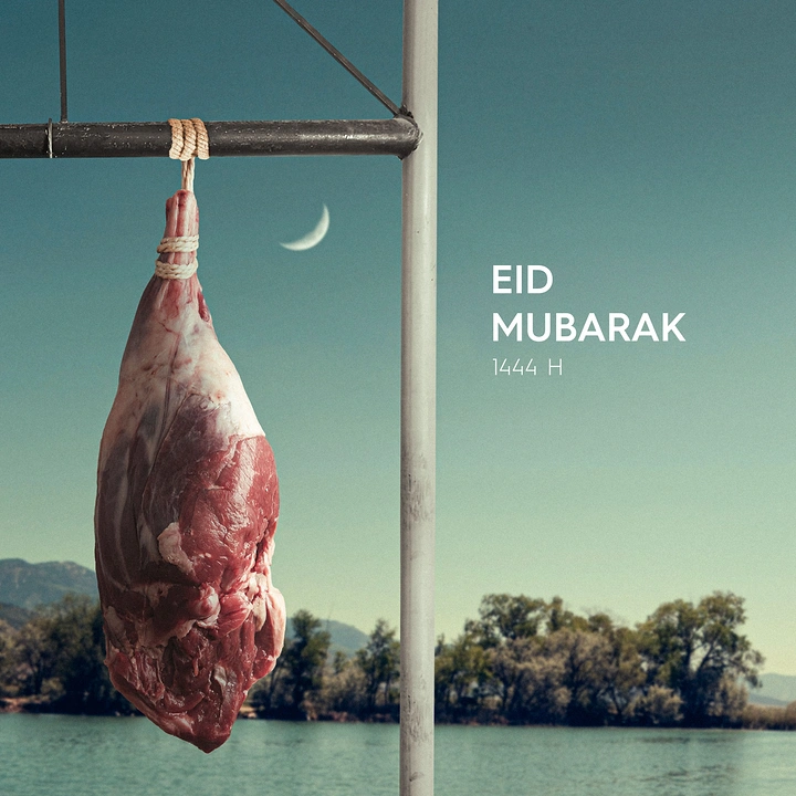 Eid creative ad: Leg of raw meat hanging from a metal bar for Eid al-Adha
