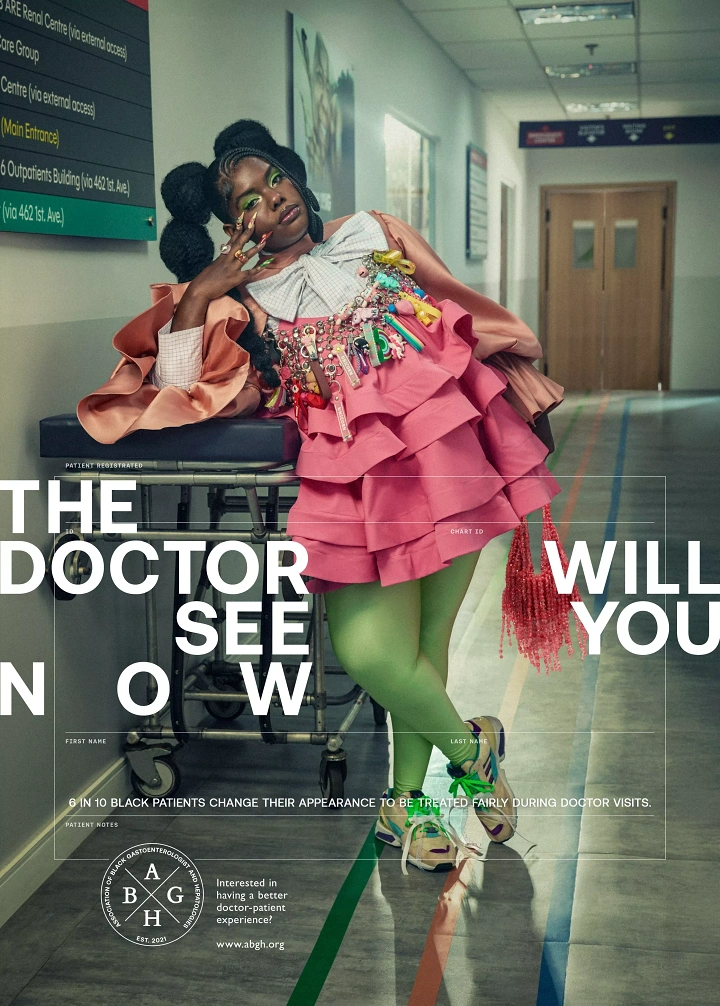 Nonprofit & Social Cause creative ad: Black woman in maximalist pink fashion posing against a gurney in a hospital corridor