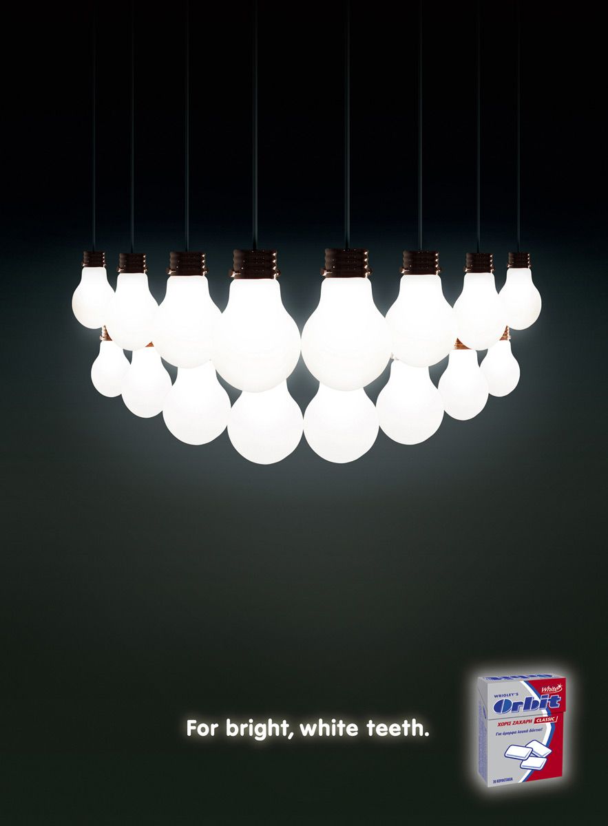 Instagram post: Lightbulbs arranged as glowing smile