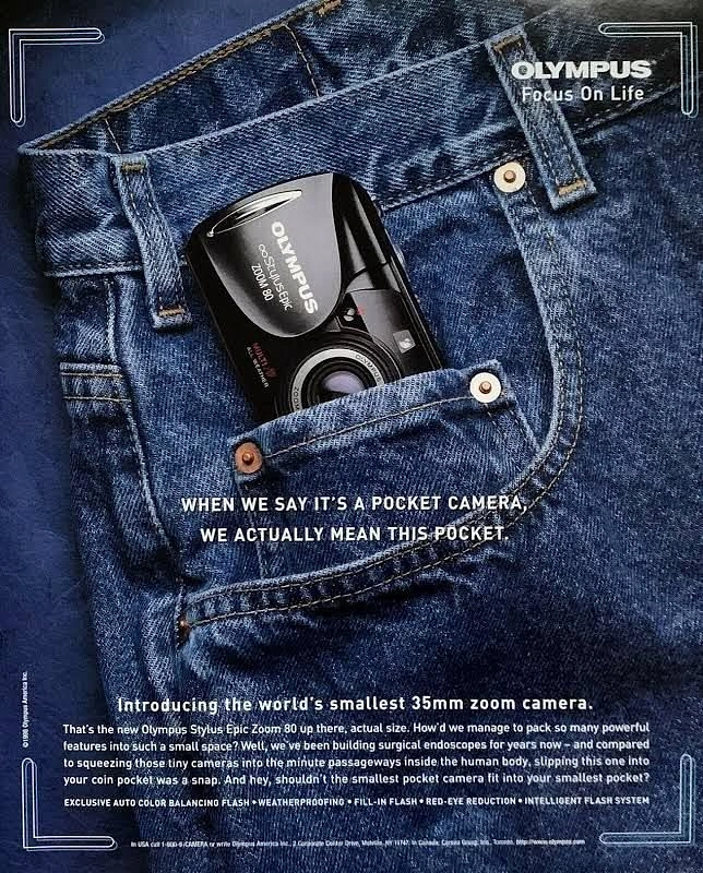 Photography creative ad: Camera fits jeans coin pocket, literal claim