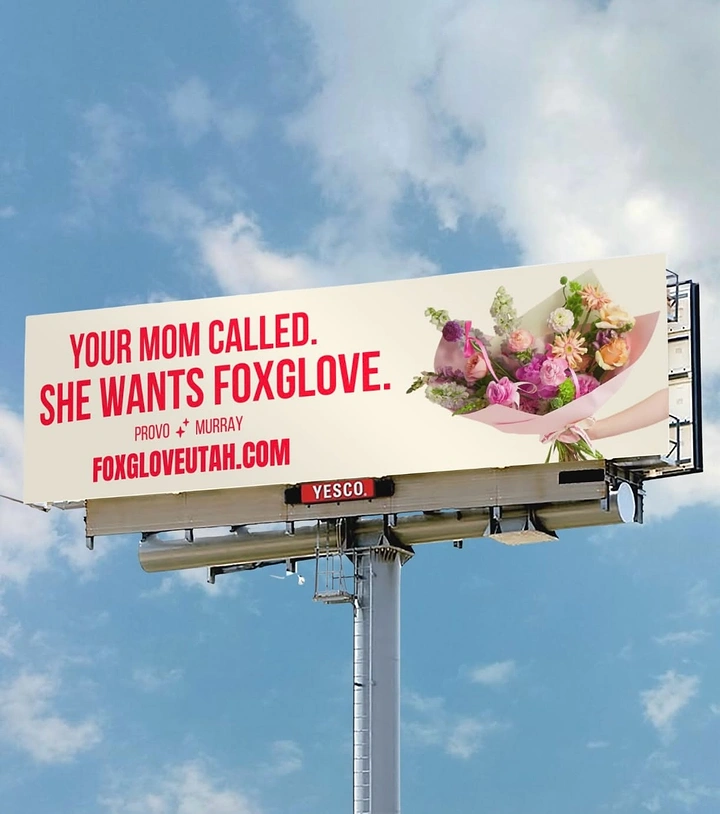 Mother's Day creative ad: Wrapped pastel flower bouquet on a highway billboard