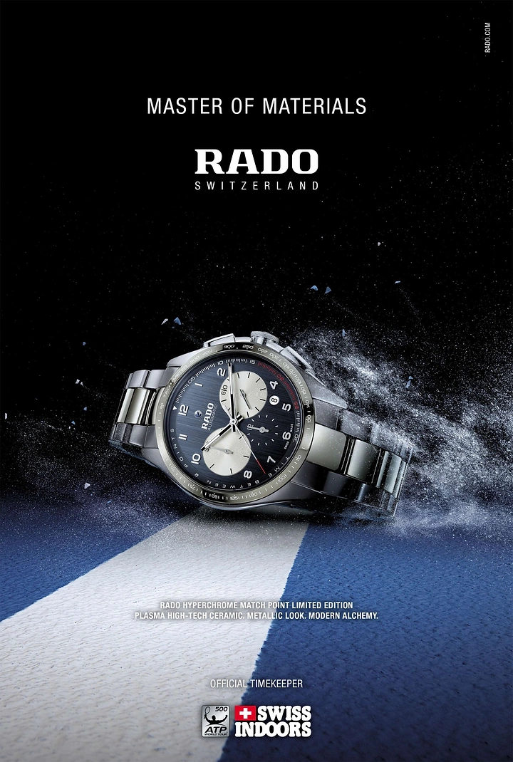 Creative ad: Ceramic chronograph skidding across a blue tennis court in a burst of dust