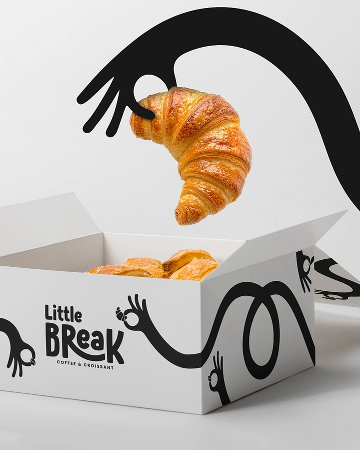 Coffee Shops creative ad: A cartoon arm lifting a croissant out of a branded pastry box