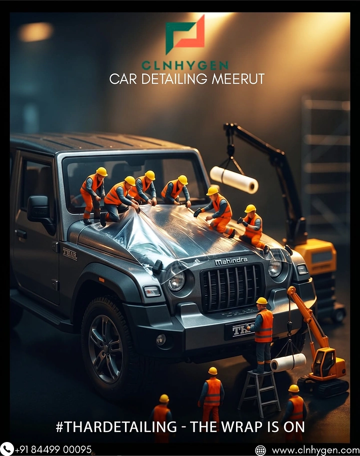 Car Wash & Detailing creative ad: Tiny construction workers wrapping a grey SUV in protective film